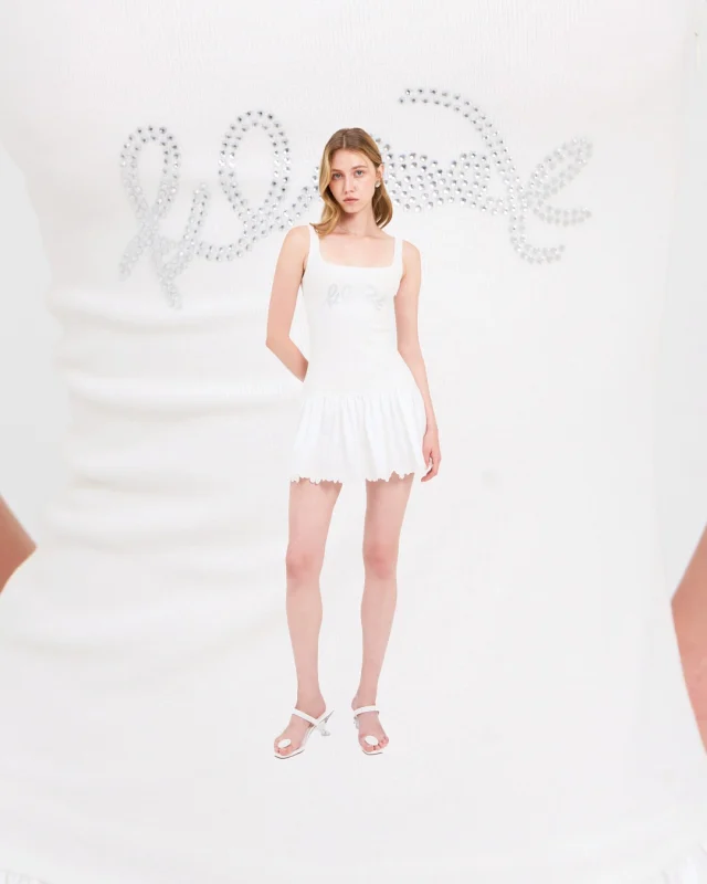 Bloom with every step in the Kloset Flared-Hem Dress.  #klosetSS25 #WhenWeWereYoung