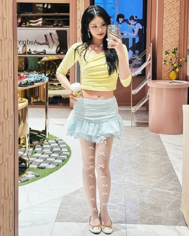 Khun @allynitibhon in Drapped Top with Tie-Neck Detail and Waist Ruched Skirt with Kloset-Hem Ruffle 💗  #klosetSS25 #WhenWeWereYoung