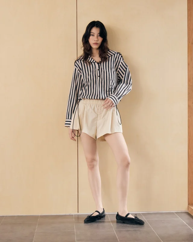 Prepping for the big match — in soft, sport-infused stripes.  Sailor Stripe Drawstring Top and Parachute Skort available now at all Kloset stores and online.  #klosetLS25 #stuckwithyou