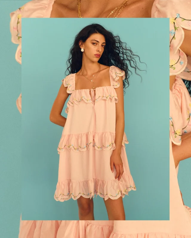 Coral Embroidered Scallop Dress in soft pastel pink,
with ruffle details and coral embroidery.  Lightweight, relaxed, and effortlessly put together.  #KlosetSS26
#KlosetLettingGo