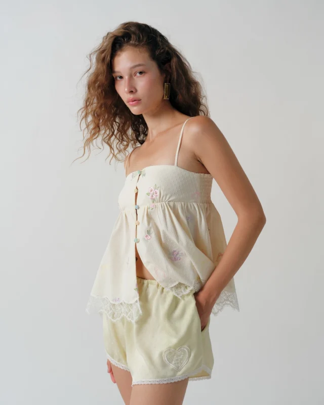 Delicate floral embroidery, lace trims, and dreamy textures come together in the Summer Bloom Lace Camisole, paired with the Golden Hour Lounge Shorts for the sweetest summer set.  #KlosetPF26
#KlosetICantStop